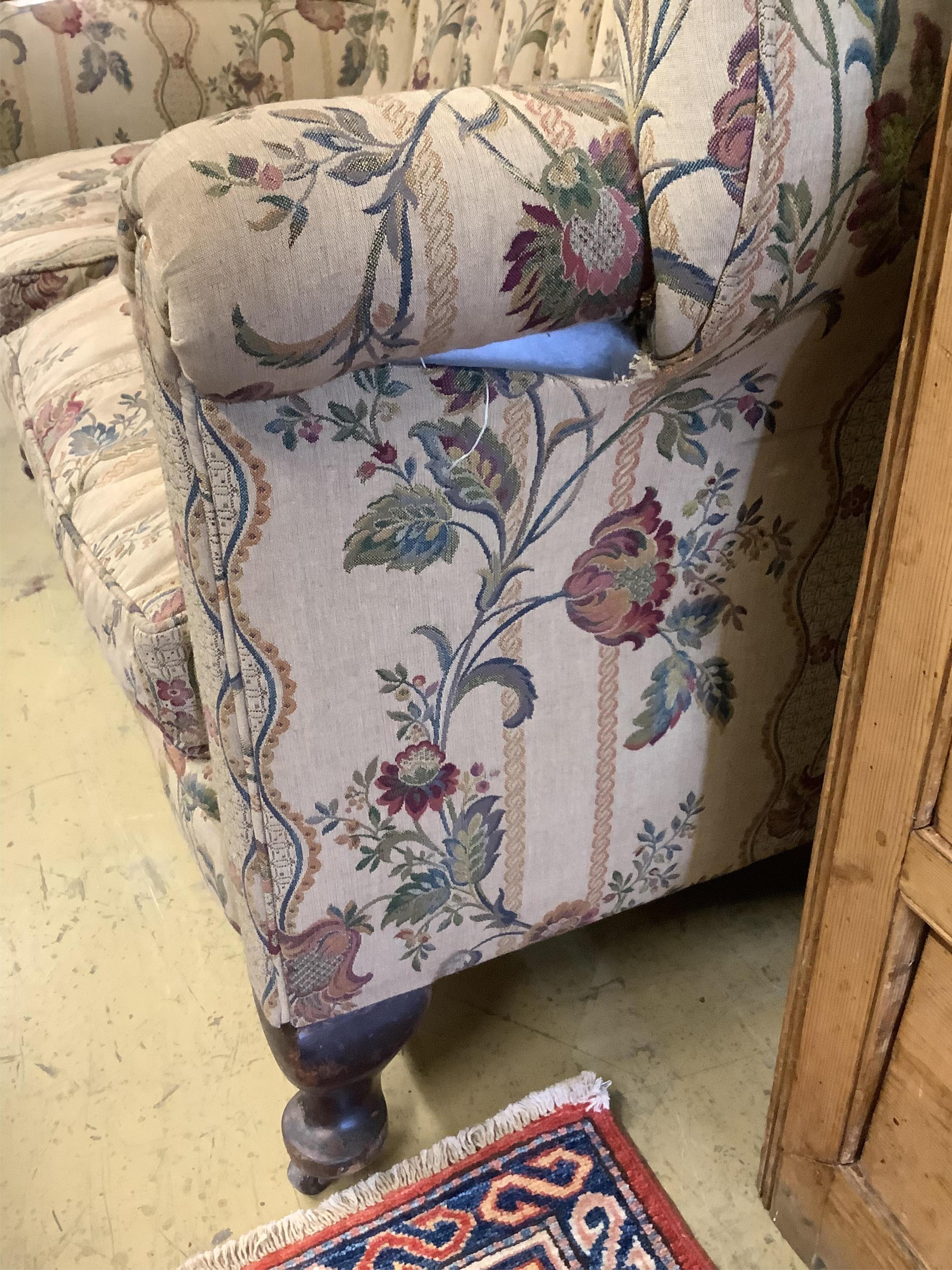 A barrel back upholstered 1920's two seat sofa, length 140cm, depth 70cm, height 110cm